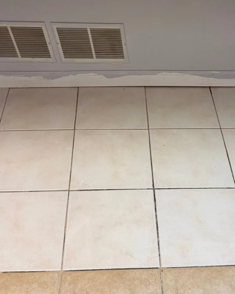 Clean tile floor under a kitchen prep counter after cleaning in Lawrenceville, GA