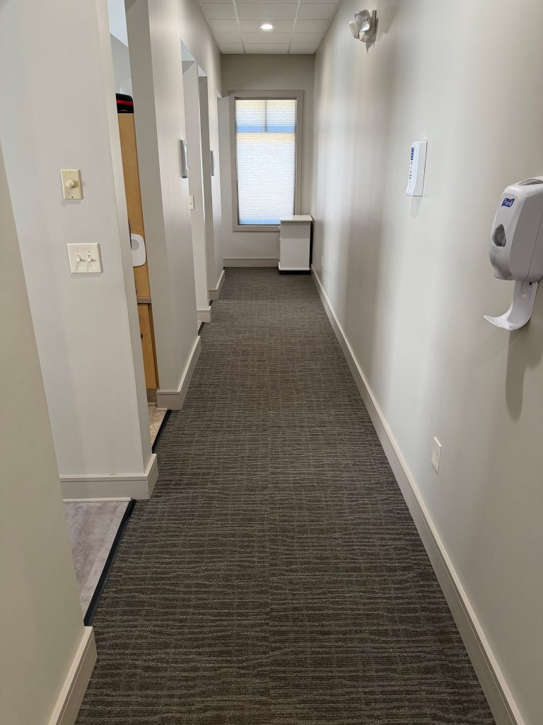 Vacuumed carpet hallway in a dental office in Lilburn, GA
