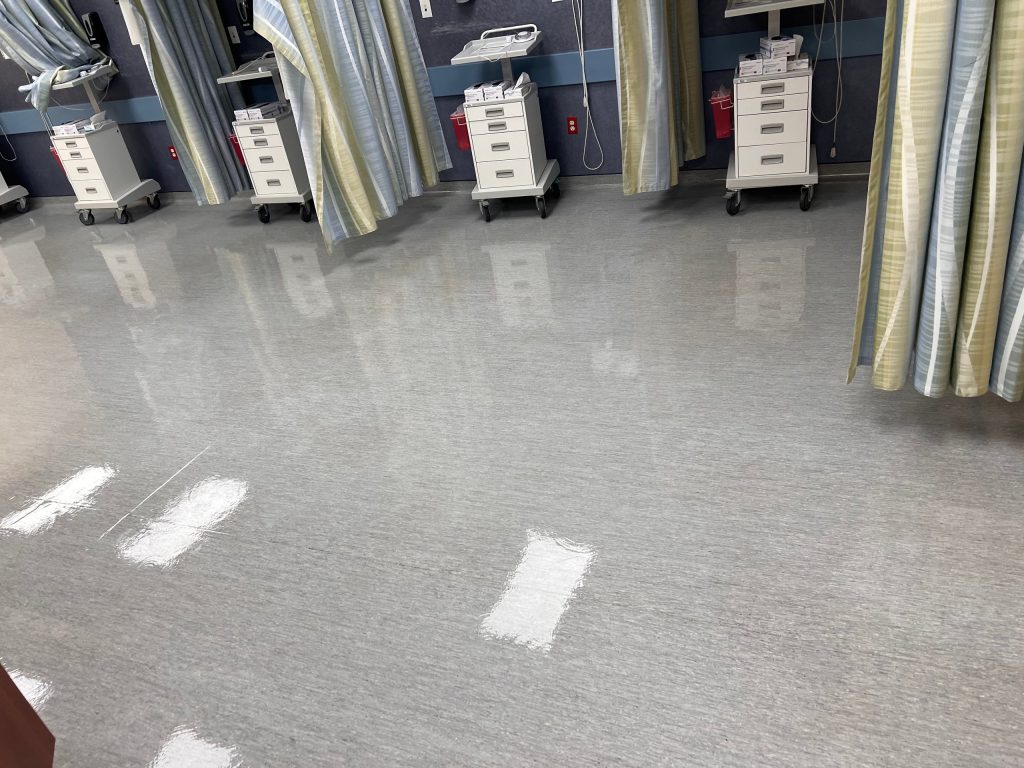 Glossy freshly finished floor in a medical pre-op area in Lawrenceville, GA