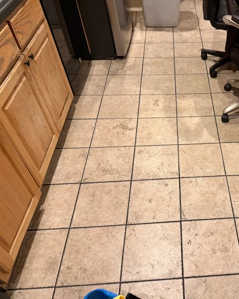 Office break room tile floor with scuffs and dirt before cleaning in Lawrenceville, GA