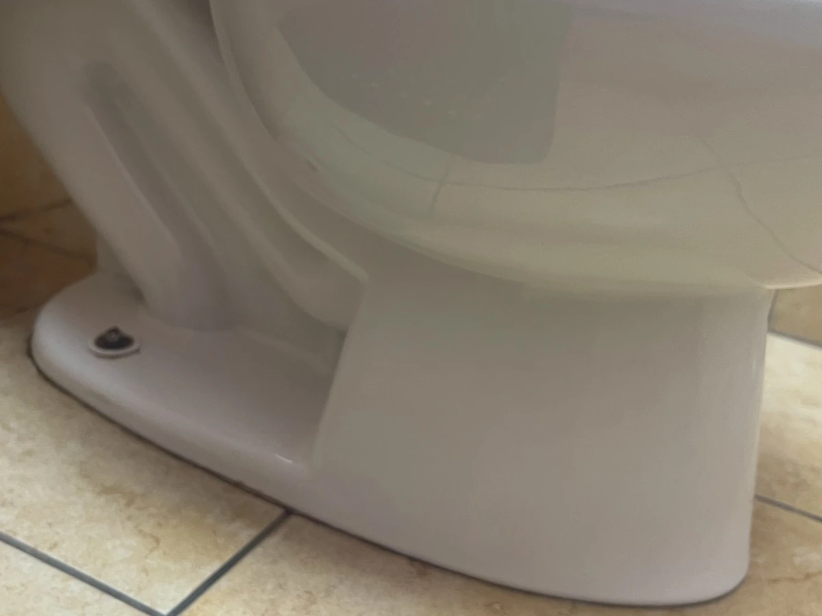 Toilet base and floor line in a medical office restroom after cleaning in Lawrenceville, GA